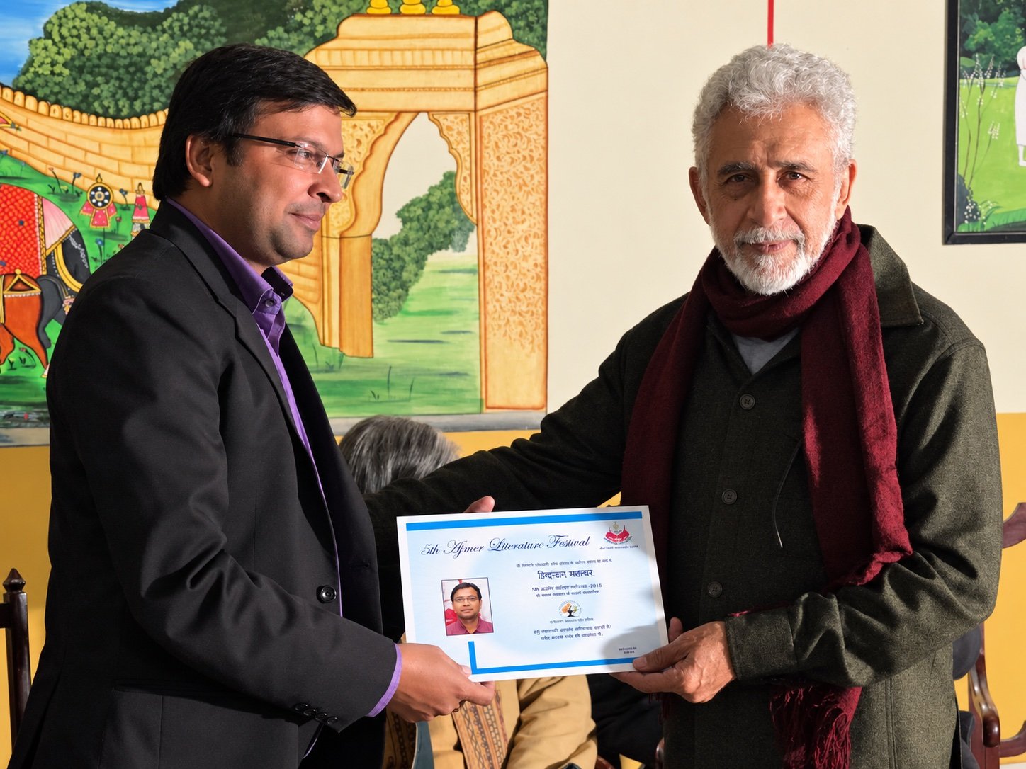 Certificate presentation at a gathering